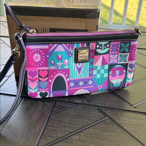 Dooney & Bourke x Disney Parks It's a small world collab wristlet bag authentic - Picture 2 of 12